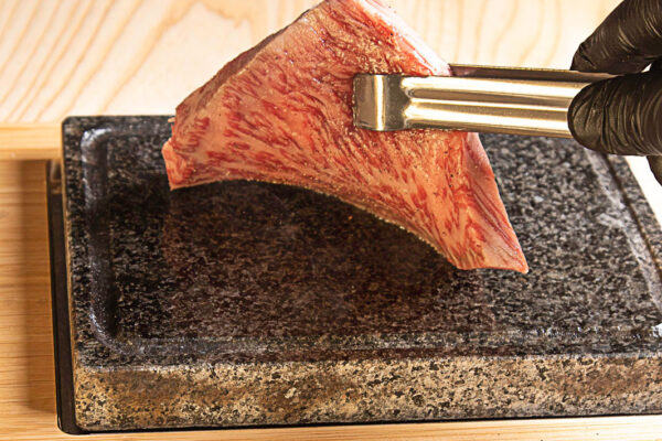 Wagyu being flipped by chef